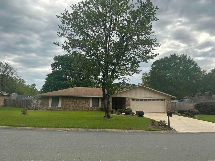 Move-in ready home with great curb appeal and wonderful location close to hospital, city amenities, and major employment, features a beautiful entry with front porch, entry hall,  large living room with fireplace and built-ins, dining room with built-ins, open to LR, large kitchen with breakfast area, new flooring, stove with microwave/vent-a-hood, dishwasher, large pantry, access to the sunroom that leads to a large covered patio and fenced backyard, features 3 bedrooms with large closets, two baths, new commode, master suite has walk-in shower, hall bath has shower over bathtub.  The laundry closet has cabinets above washer and dryer, a large double garage and storage shed. Home features new windows, central unit, Roof replaced 9/2020.  This is one you must see to know all the great features of this home.