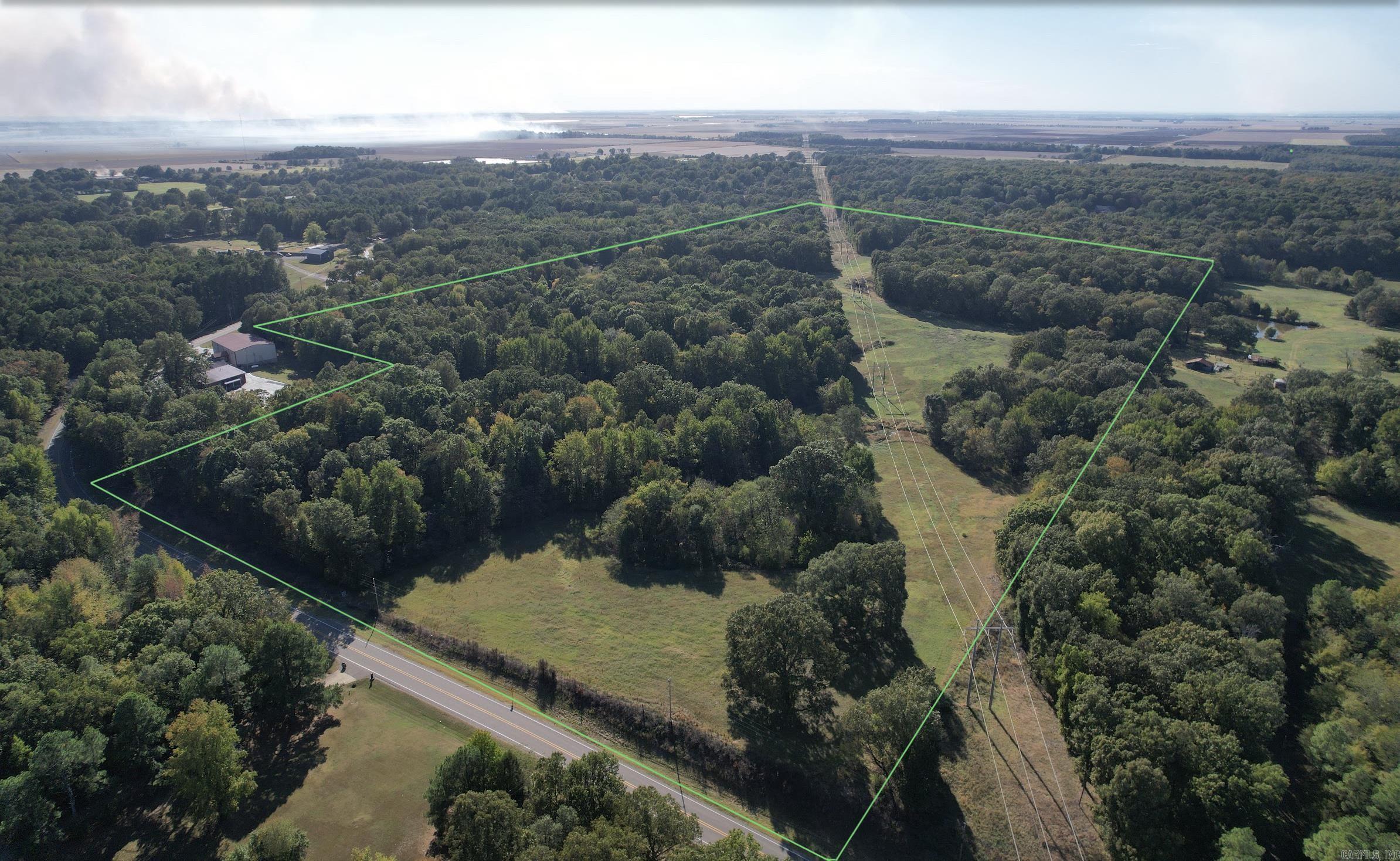 Price Improvement! Just outside the city limits of Jonesboro the flat farm ground gives way to beautiful rolling hills and patches of timber. Ā It's in these foothills of Crowley's Ridge that the 76 acre Jonesboro Homestead makes it's footprint. Ā When you pull off the paved road you feel like you're leaving all the hustle and bustle of the world behind as the pasture greets you and you start making your way through the property to the house and shop. Ā There are some picturesque oak trees on this place...the kind you see in a painting or a movie scene. Ā The wildlife is thriving too. Ā If you aren't seeing deer, you are seeing deer sign. Ā Scrapes and rubs are everywhere. Ā The place is loaded with turkeys too. Ā A farm just isn't complete if you dont have a pond and shop. Ā This one checks both boxes. The shop is a 50 x 100 red iron shop with 50 x 50 of it being enclosed. Power and 6 inch water main at the road. Give us a call to schedule an appointment. Ā You won't be disappointed.