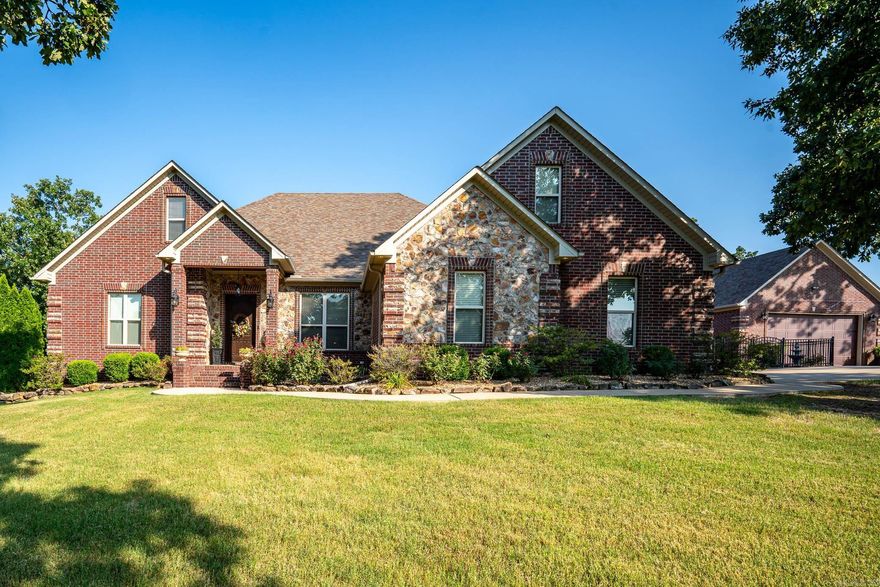 Come see this beautiful, spacious home that sits on 3.09 acres, right outside the Greenbrier city limits. This home is semi secluded from neighbors with a partial view of the valley below. The master suite has recently been remodeled to feature a gorgeous custom tile shower, free standing tub, and gorgeous quartzite countertops. This home features spray foam insulation, a new gas tankless hot water heater (2022), newer kitchen appliances, surround sound, sprinkler system, 2 car shop, mature landscaping, gunite pool, and many more updates the current homeowner has recently done.