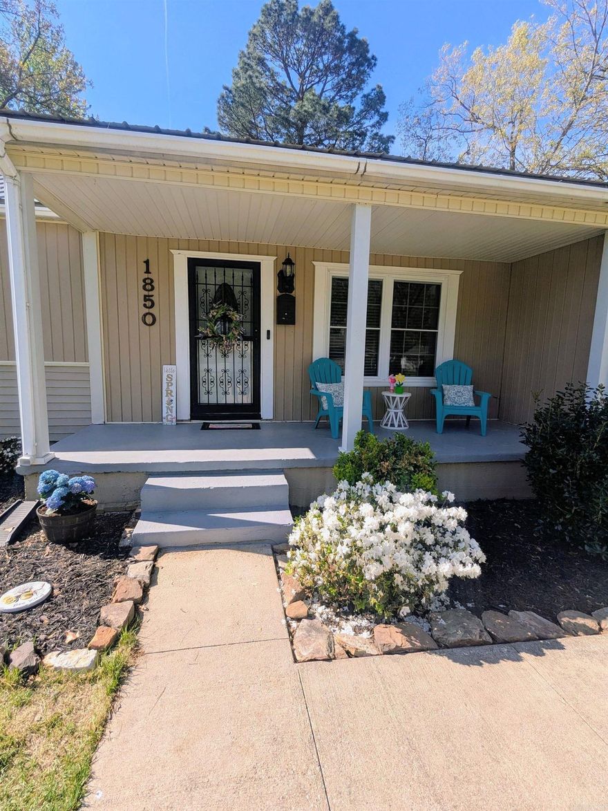 Charming 3 bedroom, 2 bath home within walking distance of Lyon College features a big front porch, large attached 2 car carport, hardwood floors, and a spacious living room with a beautiful gas log fireplace open to the dining area. The kitchen and baths are updated (2024 all new appliances and 2025 new plumbing); the main bath has a tiled shower with glass doors, and the second bath includes a tub/shower combo. Abundant windows provide natural light. The bedroom closets are cedar lined. The windows, roof and HVAC are newer.  The large, partially covered back deck and fenced yard are ideal for pets and kids. A shed offers storage or workshop space, and there's a utility room for extra storage just outside the back door.  Legal Description: Block 002/ L8 E1/2 L9, East End Heights, Batesville AR, Independence County