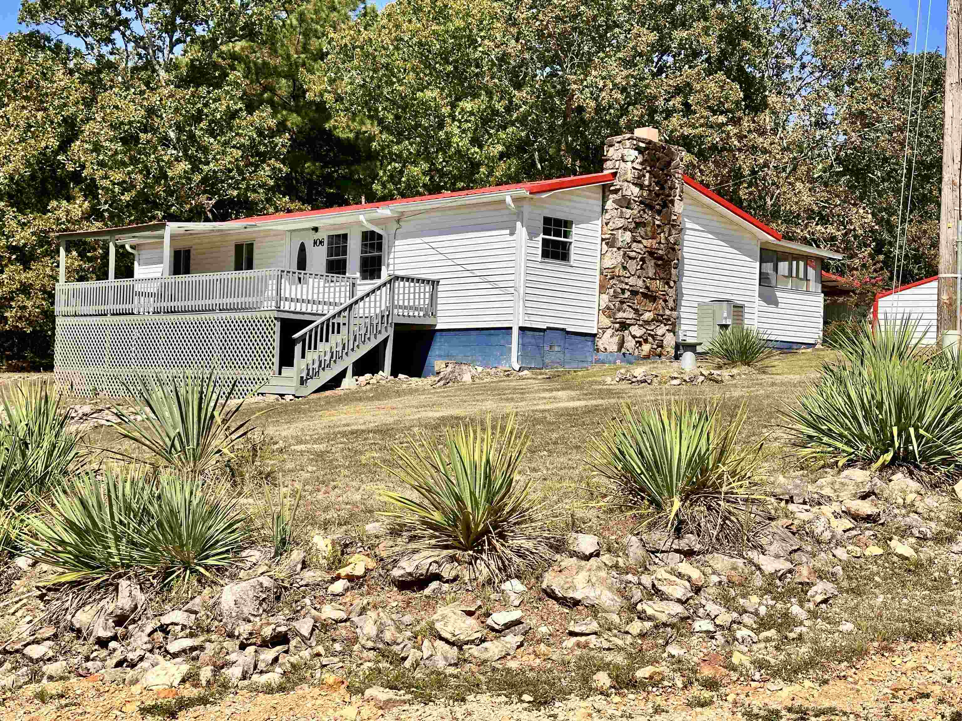 Welcome to your own private slice of country living! This charming 3-bedroom, 1-bath home is nestled on a sprawling 10 acres m/l, offering the perfect blend of rustic tranquility and modern convenience. The property boasts a detached 2-car garage with a built-in workshop, ideal for hobbies or storage. Additionally, a separate 24' x 24' metal building presents an exciting opportunity to be transformed into a cozy guest house, a dedicated craft room, or a private studio. The land offers a balance of woods and open ground and includes a potential home site complete with available utilities, providing an excellent chance for future development. Enjoy the peace and quiet of a rural setting with the added benefit of city utilities. A newly replaced metal roof in 2025 ensures durability and peace of mind for years to come. Don't miss this unique opportunity to own a versatile property with endless possibilities!