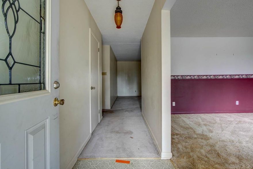 Possible owner financing!!!  This four bedroom, two bath traditional brick ranch style home is located in the Lake Hamilton School District and features a two stall garage, covered front and back porch, fenced backyard with detached out building.  Seller to give Buyer a $10,000 remodeling allowance with bank financing.