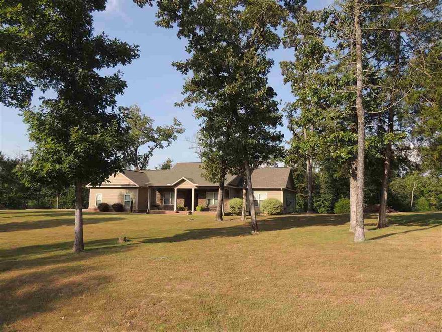 102 DOVE PLACE~~Beautiful custom built one level home on 3.76 acres~~4 BD/3 Bath + Bonus Room.  This home offers designing finishes:  granite, stainless appliances, hand scraped hardwood floors, tray ceilings, woodburning fireplace (can be switched to gas logs), beautiful cabinetry  and lighting. This is a new subdivision located just minutes from Lake Hamilton School.  Come enjoy your private country setting.