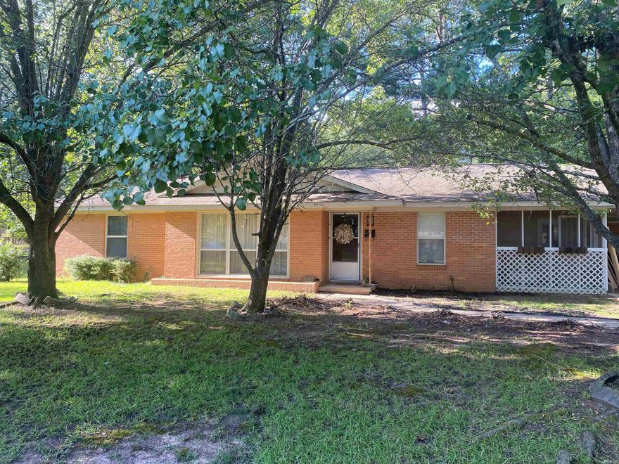 Lovely home with wonderful charm. Has original hardwood beneath luxury vinyl that could be restored but the vinyl is absolutely gorgeous.  Very spacious home with large closets, eat in kitchen with butcher block countertops, large dining room and features a huge back fenced in yard. Great property to take a look at. Some updates were being made but not completed. Sold as is.