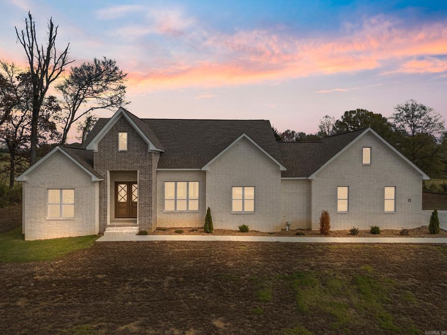 Step into this gorgeous 4 bedroom, 3 full bath, custom built home. This new home has all the things. The primary suite is something you just need to see in person. The kitchen has beautiful quartz countertops, a large walk in pantry, a double wall oven, and gas cooktop. The living room features a gorgeous brick accent wall, and is open to a large dining room, and foyer. This home comes move in ready with paint matched blinds on every window, and a nice entertaining area off the covered back porch. Call to see this home today!