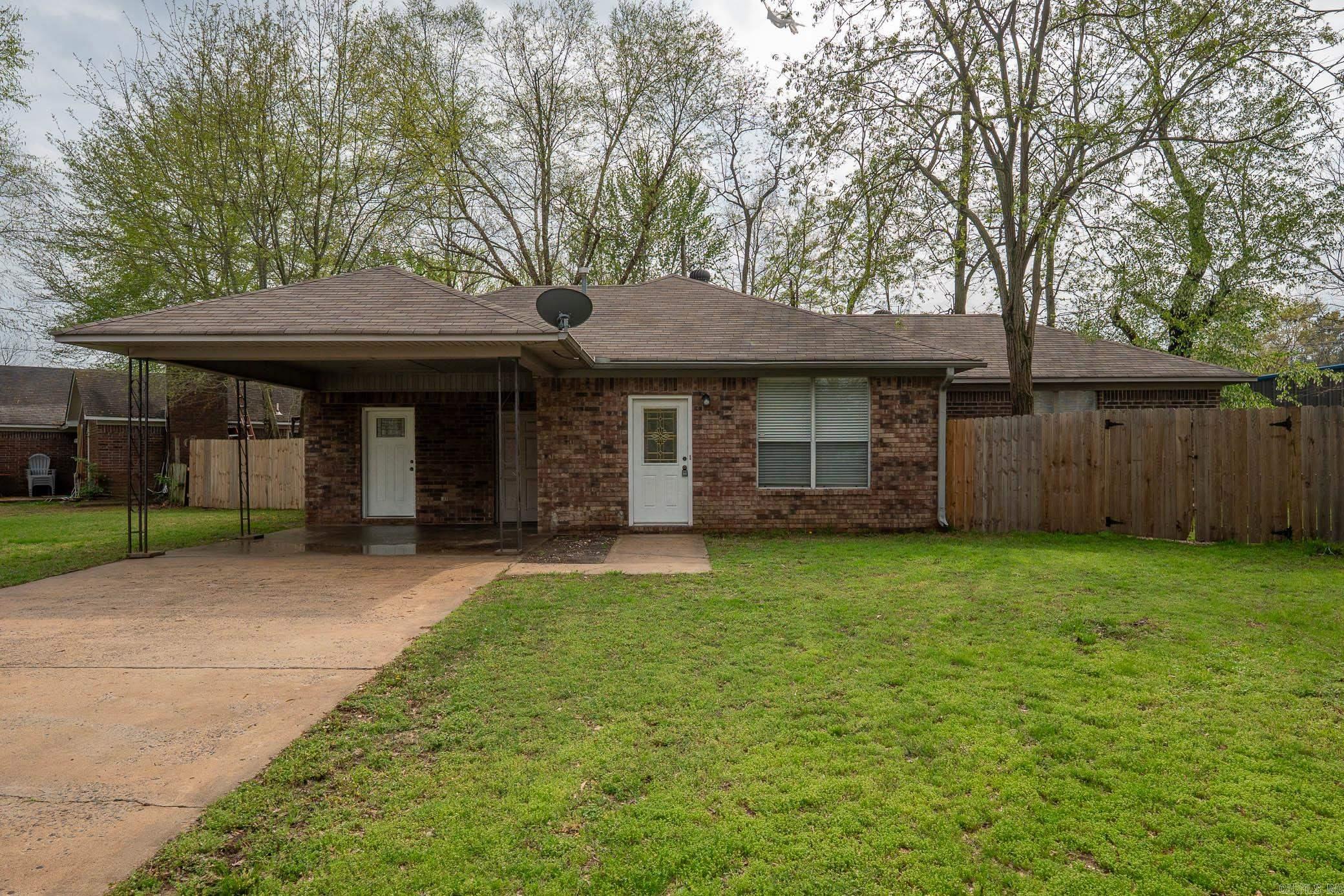 Come fall in love with 8 Steele Magnolia Drive in Greenbrier! Situated on an oversized lot, this two bedroom, two bathroom home, with another room perfect for a third bedroom, office, or nursery features two living areas, a fully fenced backyard, an outdoor storage shed, and has been freshly painted for you! This home is conveniently located to restaurants, schools, and more. One of the living areas was formerly used as a theater room, but could be converted into an amazing master suite if you so choose. There is a ton of potential with this spacious floor plan. Schedule your showing today to see if this is the one for you!