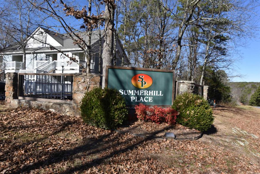 Experience the ultimate in serene living with this exquisite Summer Hill Place condo, perfectly nestled amidst the lush canopy of the Ozark Mountains. Walk-in unit for easy access. This recently updated studio offers a seamless blend of modern elegance and nature’s tranquility. Step inside to discover a beautifully refreshed interior, boasting new floors and a fresh coat of paint.  Designed with efficiency and comfort in mind, the studio features a cozy sleeping area, a sleek modern bathroom with a rejuvenating shower, and a well-appointed kitchenette that makes meal preparation a pleasure. A laundry room provide added convenience for everyday living. For moments of relaxation, step out onto your private back deck and lose yourself in the serene views of the surrounding woods. Enhance your lifestyle with access to an array of resort-style amenities right at your doorstep. Dive into any of the three sparkling pools, perfect your swing at the two beautifully maintained golf courses, or explore the pristine waters of nearby Greers Ferry Lake. Plus, enjoy all the vibrant recreational and cultural offerings of Fairfield Bay.