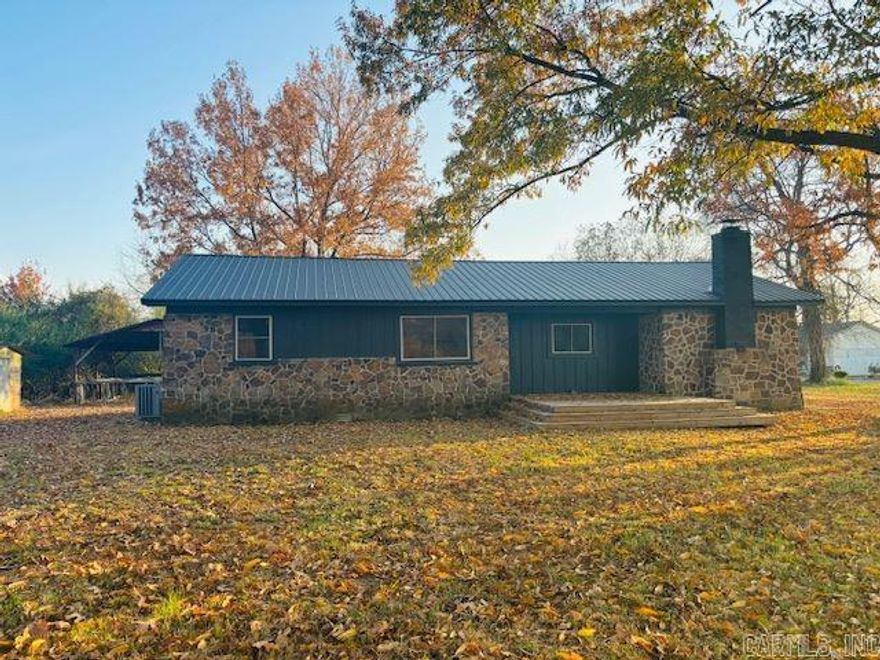 Charming country retreat on a full acre in peaceful Enola! This updated 3-bed, 2-bath home offers an open-concept living, kitchen, and dining area with a large island, quartz countertops, and stainless appliances. LVP flooring flows throughout, complemented by new plumbing, wiring, updated siding, and a sleek matte-black metal roof. An Entergy energy audit has been completed, with additional insulation scheduled soon, and fresh caulking added around windows, doors, and the fireplace to prevent air leaks and boost efficiency. The cozy primary suite includes its own private entry and a charming wood-burning fireplace. Outside, enjoy two outbuildings, open space, and a storm cellar. Just minutes from Conway and Greenbrier!