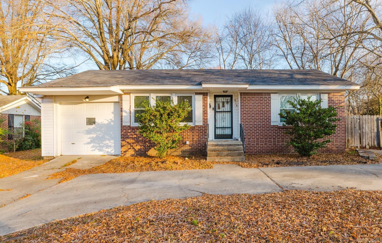 Charming and full of character, this 2-bedroom, 2-bathroom home in downtown Benton offers the perfect blend of comfort and convenience.  Featuring two inviting living rooms, a screened-in porch, and a fenced yard, it’s perfect for relaxing or entertaining. With the added convenience of a 1-car garage, this home is an ideal choice for anyone seeking comfort and a prime location.