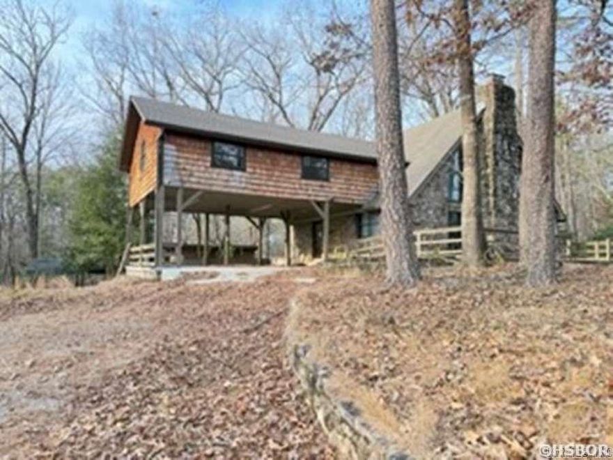 MOUNT IDA.. 4BR 2 BATH $285,000!! located at end of cul-de-sac on 1.50acs and less than 1 mile to gorgeous Lake Ouachita this home has 3,492sf living space!! offers vaulted ceilings in living room/dining room combo with floor to ceiling rock wood burning fireplace, lots of windows for natural light & beautiful change of Seasons!! other amenities are nice deck, carport 2-car and downstairs den/family room w/fireplace, full kitchen, BR/bath all with inside/outside access!! All levels heated/cooled; separate 18x28 shop building with concrete flooring, attached covered parking shelving & lots of storage!!! SELLER does NOT pay customary closing costs to incl title ins, termite, survey, H-warranty, repairs or any closing costs.. this property may qualify for Seller Financing (Vendee); go to vrmproperties.com; if property qualifies, only buyer may speak w/loan officer; if built prior to 1978, lead base paint potentially exists; recent lender pre-qual letter and earnest money required with all offers