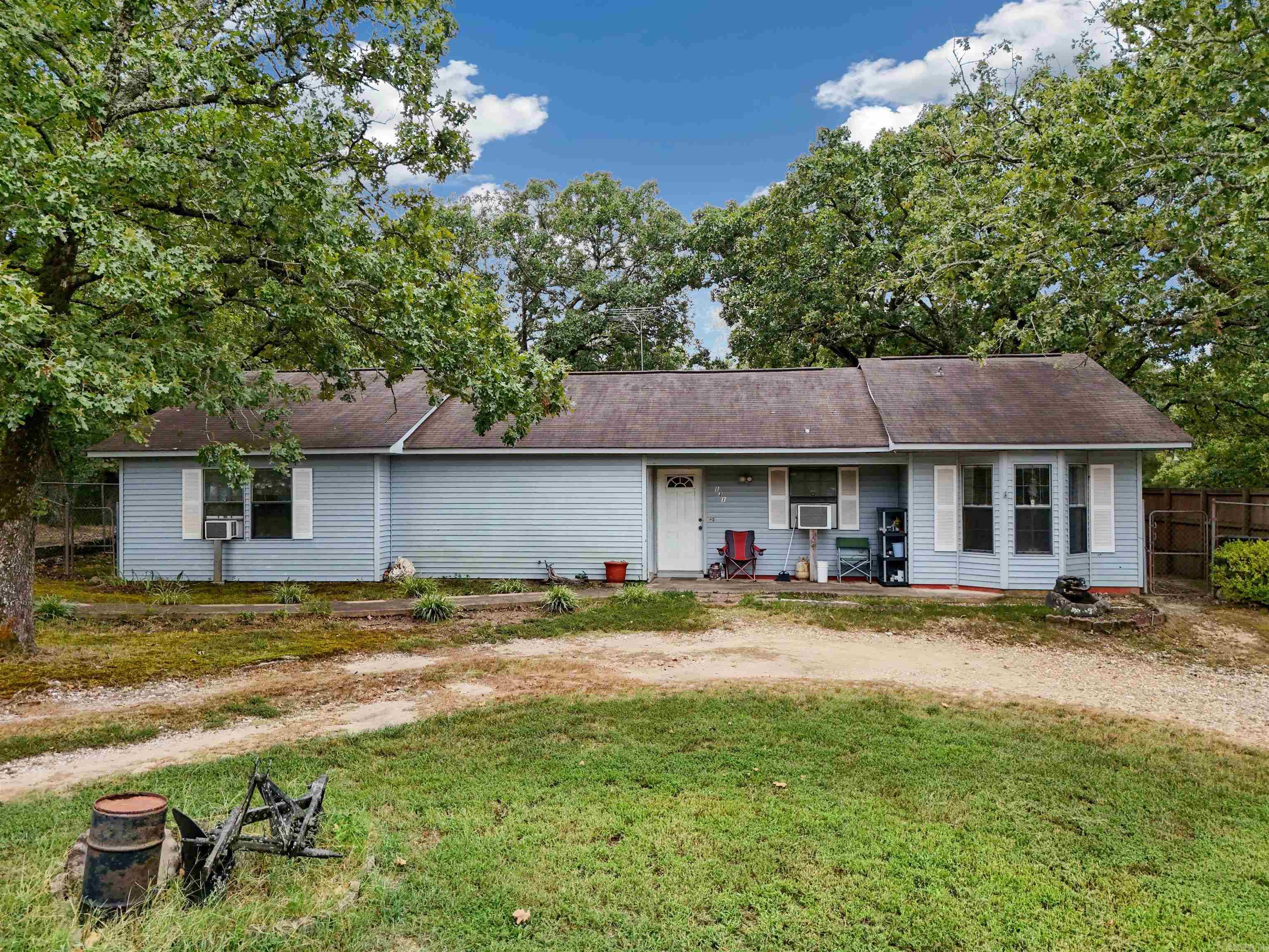 Cute home sitting on 2.11 acres in Hot Springs, fenced in back yard, sitting off the main road. House is being sold-as-is, great fixer upper or someone looking for a project, owner occupied and currently livable.
