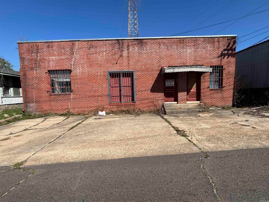 Commercial space with Open floor plan.  2 bathrooms and an office in the rear corner.