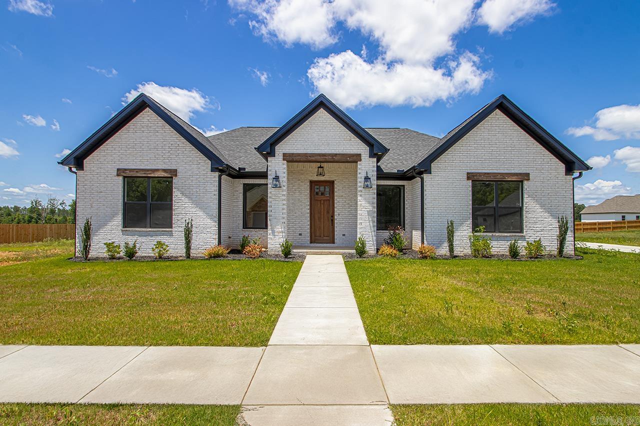 Get ready to be amazed by this incredible home! With an open concept living space, you'll love the large island perfect for entertaining. The kitchen is equipped with a gas stove top, wall oven, and microwave. Curl up by the cozy gas fireplace in the living room. The massive pantry will be your dream come true! The laundry room has a convenient locker/mud area and ample space. This split bedroom plan includes two bedrooms on one side, with a hall bath and a third bedroom at the front of the house with quick access to the half bath. The primary bedroom retreat awaits you with a spa-like bathroom featuring a large tile shower and standalone tub. The double vanities and plentiful cabinet space are the icing on the cake. Enjoy the quiet neighborhood, sidewalks, and a great area for kids to play. Don't miss out on this fantastic home! VERY MOTIVATED SELLER!! MAKE AN OFFER!
