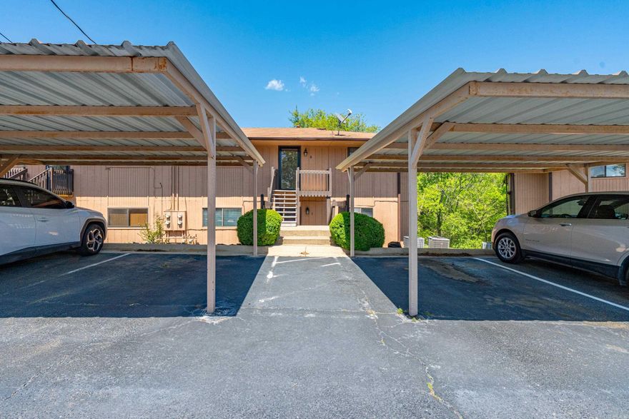 Right in the heart of Hot Springs sits this cozy condo complex.  It is is close to all that Hot Springs has to offer yet tucked away with privacy and very safe.  It is a perfect location for full time living or Long term rental is allowed here.  It is just a couple of minutes from Oaklawn Park and Casino as well.   Amenities include a walking path and a lot of green space that is perfect for pets, a creek, private carport, and swimming pool.  The interior has been well maintained and ready for its next owner.  HVAC was replace in 2024.