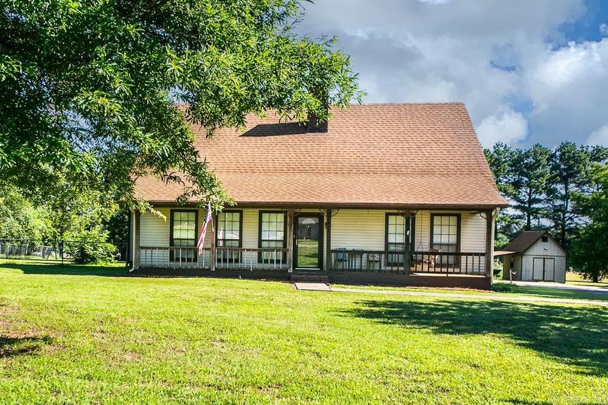 Great Country Home sitting on  1.5 tree shaded lot. Big front porch, extra covered parking, storage shed, bonus room over the garage, quartz counter tops, wood flooring and more.