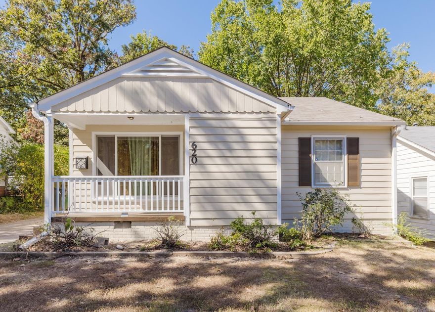 Welcome to the cutest cottage in a prime location only 3 blocks from UAMS. This home has all the original character and charm, with some necessary items already addressed....new roof 2023, new HVAC 2024, exterior & shutters painted 2024, front porch repaired & painted 2024, living room & primary BR painted 2024 (LR & BR painted since pics). Original hardwoods throughout the living room, 2 bedrooms & hallway. Primary bedroom has vinyl flooring & a spacious closet. The kitchen has a gas stove & plenty of space for a breakfast table. There are beautiful built-in cabinets in the hallway for extra storage. The huge front window in the living room has been replaced within the last few years by a lovely window that opens...which provides a nice view to your front patio. There is a fenced in backyard and gate for carport. Location is ideal for a long-term rental, AirBnB, or to suit your personal needs.