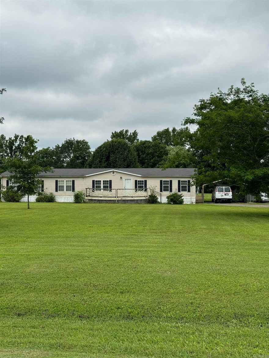 Country Living!  Don't miss out of this 4/2 2128 sq ft MH with Fireplace and bonus room. Nice large decks with a screened in porch for early morning coffee enjoyment or afternoon BBQ's. Great place to entertain.  Close to all of Beeb's amenities. This property supports a 30 x 50 shop with electric, bath and water.  Shop also has a hookup for a washer and dryer.  Many possibilities with this piece of property.   Call today for a tour of this lovely property.  It won't last long!  Agents see remarks.