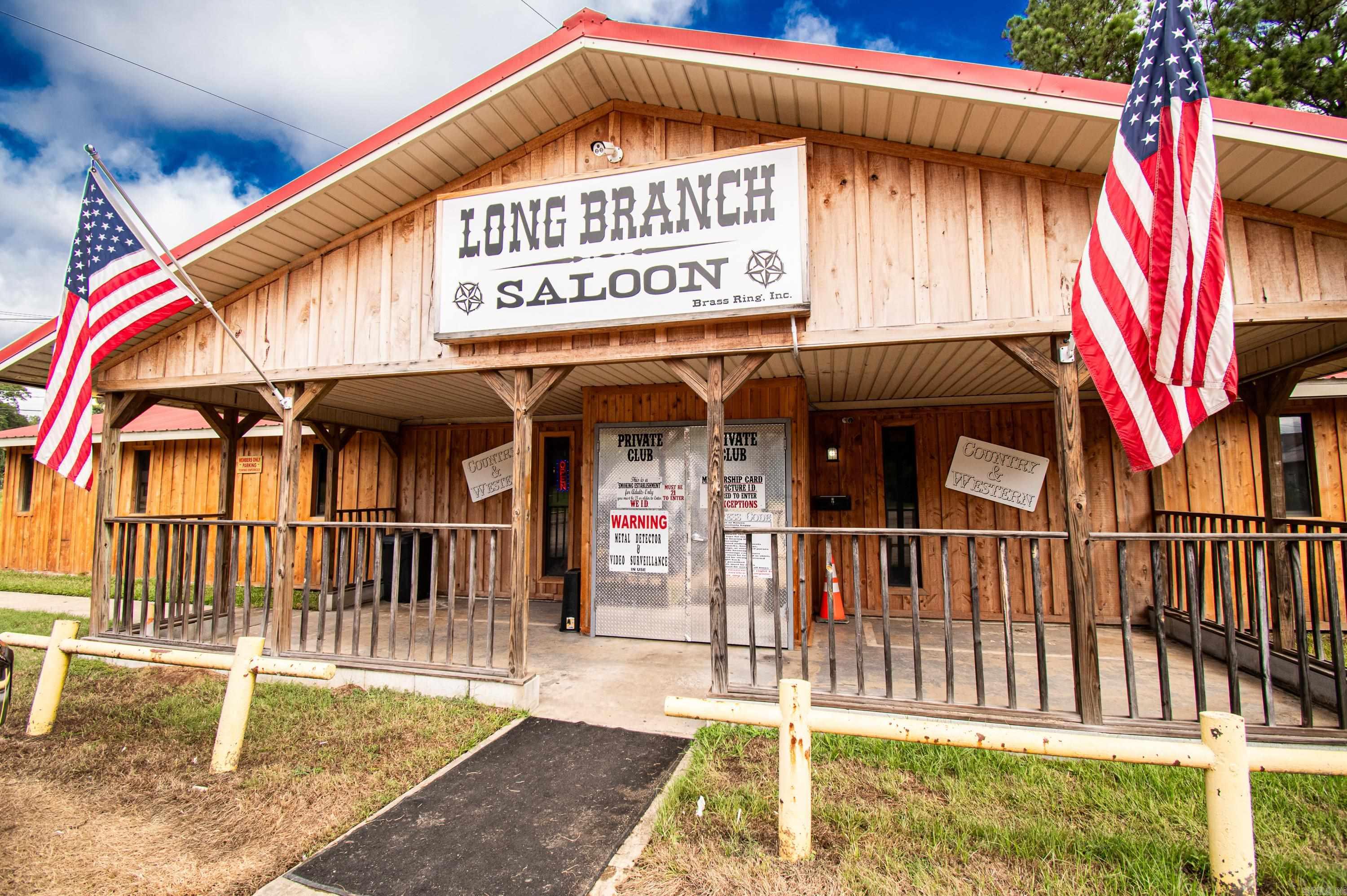 The Long Branch Bar is located at 204 Strong Highway in El Dorado, Arkansas. The establishment has been at that location since 1993. In 1993 the local bar upgraded to a private club. Along with it being a private club comes with a much-envied license because it is on of the few remaining in the state that allows sale of liquor after 2AM. This type of license is no longer an option for new clubs, but the Long Branch Saloon is grandfathered in, and provides the clubgoer a place to go after the other establishments close. For this reason alone, this increases the value of the club well above the standard going rate. The owner has acquired an amusement license to be able to provide and promote entertainment. Tobacco permit allows tobacco to be sold. Live music and karaoke are regular activities as well as pool tournaments, and dart competitions. All permits are up to date and all laws are observed. The business is located just off Hillsboro Street on the east side of town where the city is expanding with much needed upgrades to the streets. The Long Branch is an important part of the community and has been in operation for more than 50 years and counting.