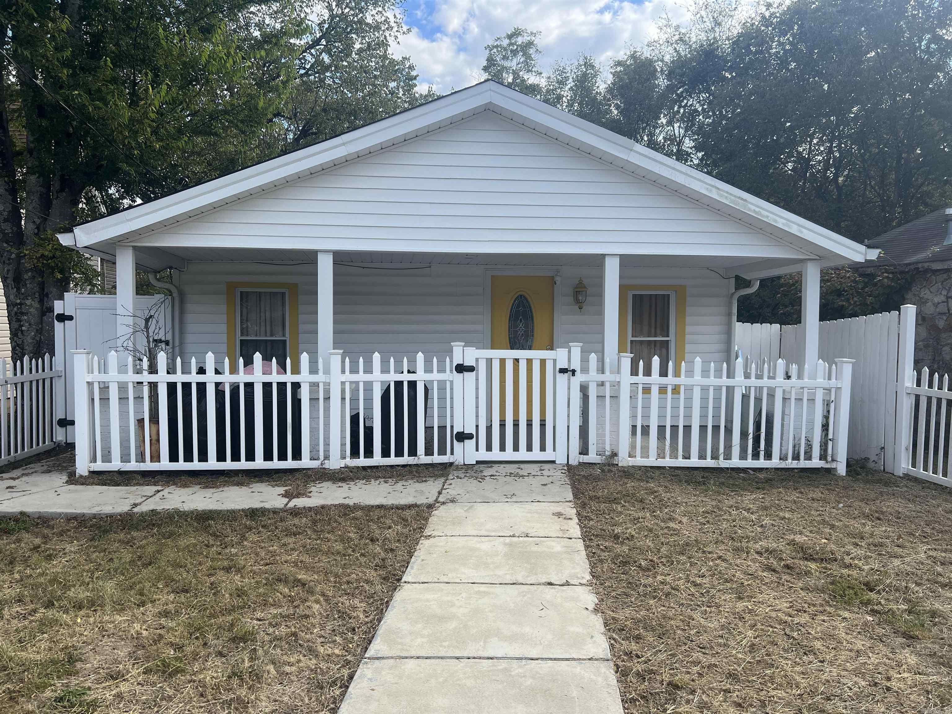 Ever dream of a home with a white picket fence? This is the home for you. Full remodel, everything new - electrical, plumbing, roof, flooring, windows, AC, water heater, appliances, fencing all new. Energy efficient design and tastefully decorated, no corners cut on anything. Ample off-street parking. Tankless water heater. Great neighborhood.