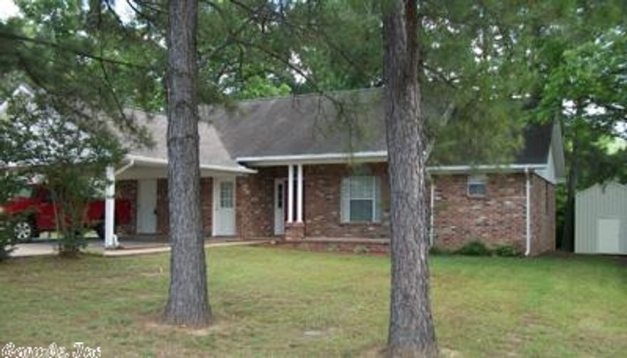 Move-in ready 3/2 with split floor plan and open kitchen, dining & living area.  Newer flooring, paint, kitchen appliances, bathroom updates, newer CH/A, new water heater, etc.  To many updates to mention--must see to appreciate.  Walk-in closets in the master suite, ample storage indoors plus storage off the carport, floored attic storage and a 2 story shop/storage building.  Extra insulation in the attic helps keep the electric bills lower. Landscaped yard with flowers, trees, garden area and small pond.