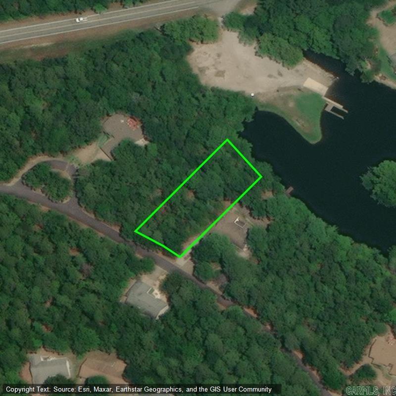 Lake Pineda WATERFRONT lot overlooking the Boat Launch! Build your dream home on this affordable 1/3 acre Lake Front lot in 26,000 gated acres Hot Springs Village. Great fishing in this 62 acre lake too! With 11 Lakes & 9 Golf Courses to enjoy, the Village offers Tennis, Pickleball, Mini Golf, Bocce Ball, Lawn Bowling, Dog Park, Archery Range, Fitness Center, Indoor & Outdoor Pools, Performing Arts Center, 2 Beaches and Marinas, 20+ Miles of Walking Trails, Restaurants, Churches, and more!