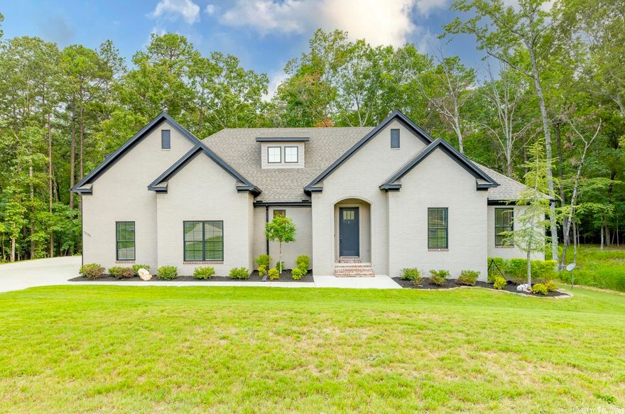 Gorgeous, like new home  In one of Saline County's most sought after neighborhoods, Tucker's Hill. Located just behind Bethel Middle, this home is situated on a 1.9 acre, wooded lot at the end of a culdesac.  The spacious open floor plan is perfect for entertaining.  Four large bedrooms downstairs & fifth bedroom or bonus room with bathroom upstairs. Large, covered patio. Three car garage.  Don't miss out on your dream home - schedule your showing today!