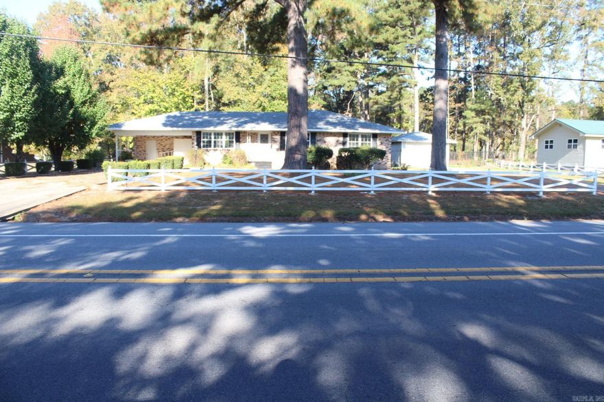 MOVE IN READY 3 bedroom, 2 baths with approx. 1520 Sq. Ft. of living space situated on a .50 acre lot.  Spacious  kitchen with wall oven (Refrigerator Conveys).  15 x 30 and 20 24 outbuildings.  Property has  a storm shelter.