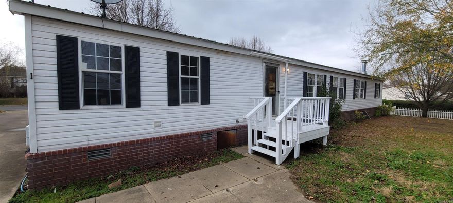 Newly updated 4 beds 2 bath. With two large living areas and a fireplace. Fenced yard with a 2 car carport and a storage building.