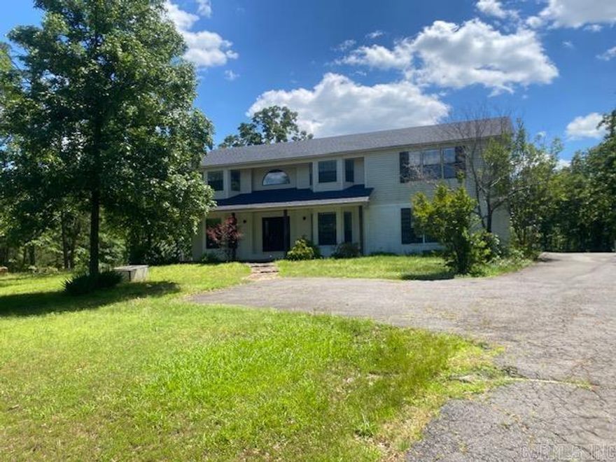 Come check out this beautiful 3 bedroom, 3 full bath home set back off the road for privacy.  Home is on 3.03 acres with trees and large deck with gazebo for entertainment. As you enter the foyer you have double doors to the formal dining on one side and double doors to the office, library or den on the other side. Step down in to this large living room with cathedral wood ceiling and fireplace with open floor plan through dining and kitchen. Upstairs you will find a nice size loft/game room or sitting room, hall bath, 2 bedrooms and the primary bedroom. The primary bedroom is huge with an amazing bathroom with his and hers sinks, separate shower room,  soak tub and walk-in closets.  New roof installed May 2024.
