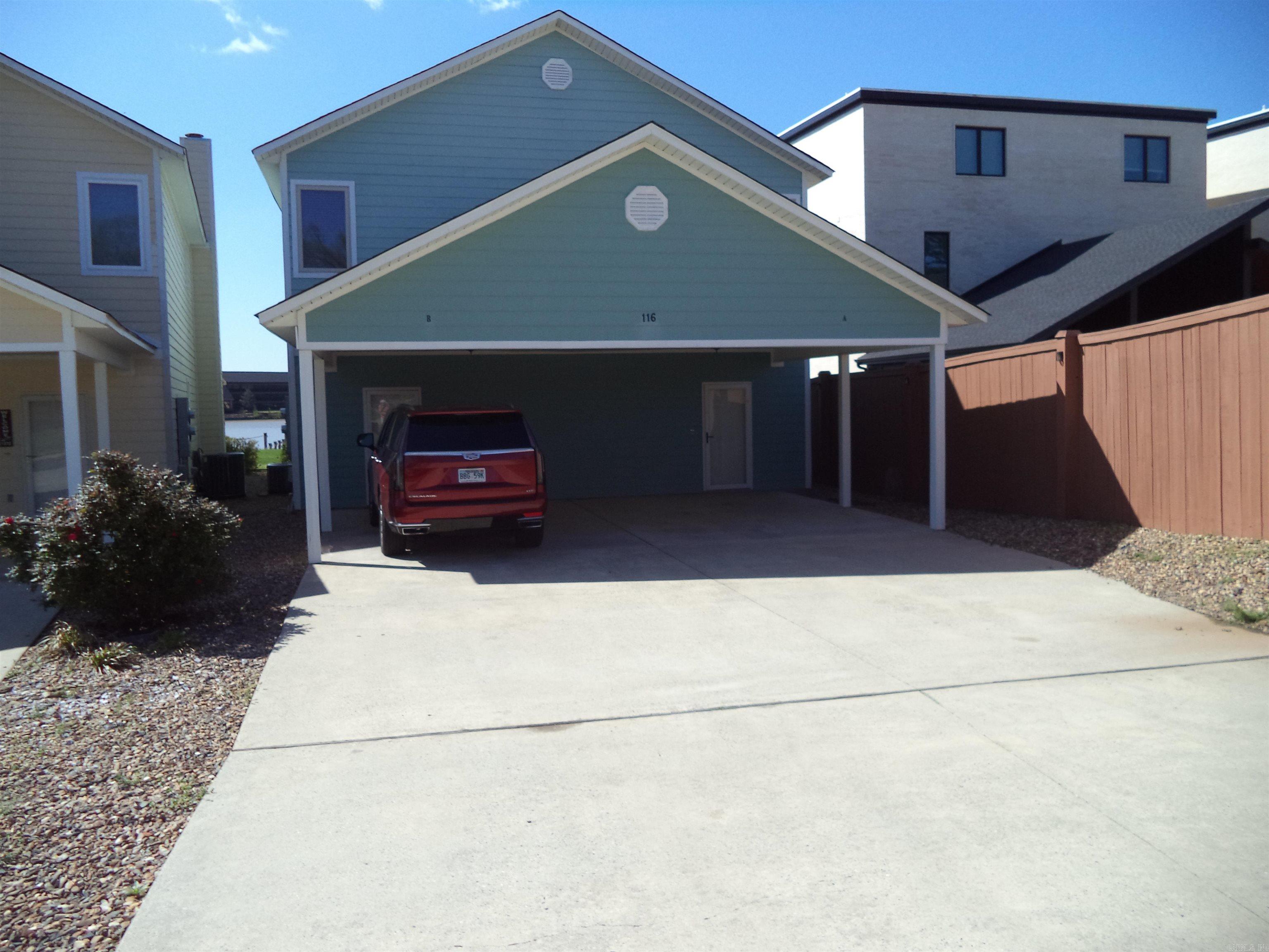 A SMART INVESTMENT ON LAKE HAMILTON WITH A BOAT SLIP.. A LEVEL LOT STEPS AWAY FROM THE WATER,, A GATED AREA CLOSE TO RESTURANTS AND MINUTES FROM OAKLAWN, THE HOME INCLUDES A FIREPLACE, COVERED PARKING, AND FURNISHED. POSSIBLE OWNER FINANCING IS AVAILABLE