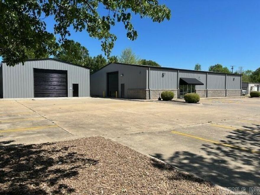 Versatile commercial space featuring a 4,800 SF office/warehouse with functional workspace and storage, plus an additional 2,240 SF storage warehouse.   Located just off Highway 64/ E Oak St, offering excellent visibility and accessibility in a growing commercial area of Conway. Positioned near major thoroughfares, businesses, and residential neighborhoods, providing a strategic location for retail, office, or service-oriented tenants.