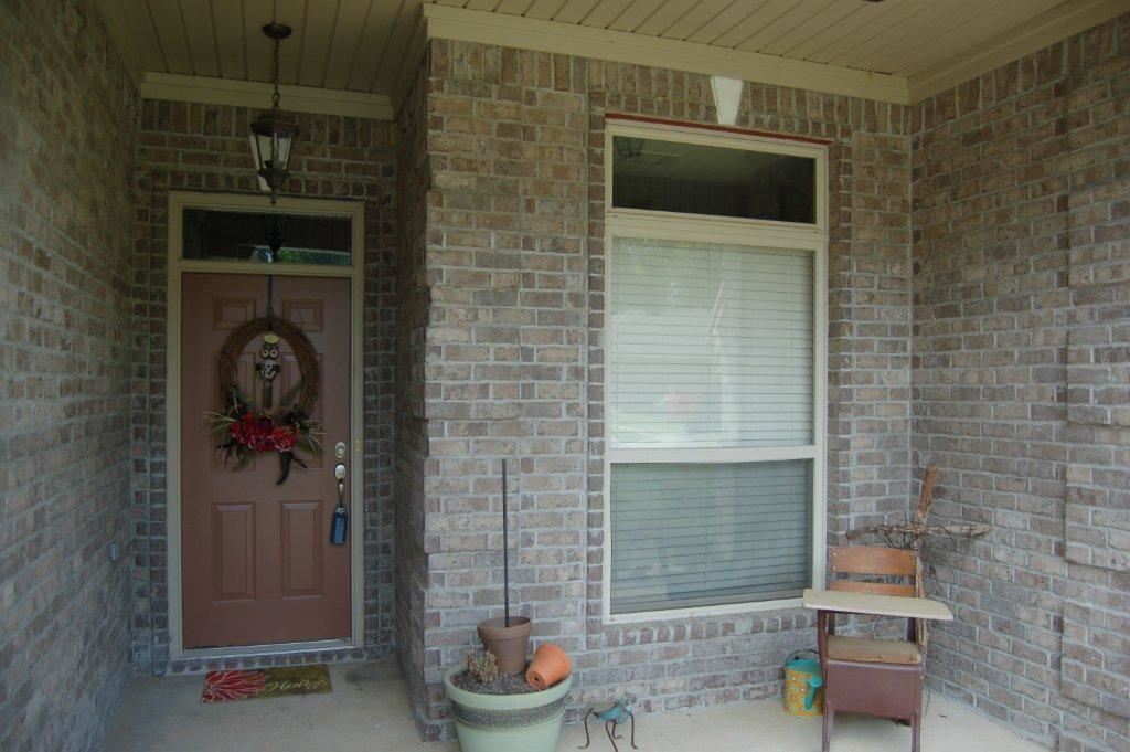 Must see this like new home w/ a spacious open floor plan. The family room boasts trey ceilings, cozy fireplace & plenty of natural light from the big windows. The kitchen has dark cabinets w/ granite counter tops & plenty of space. Master bedroom is spacious & master bath has double vanities, walk-in shower, his/her closets & jetted tub. New hardwood, carpet & pad, and new neutral paint throughout. Situated in a cul-de-sac w/ very spacious back yard. Please measure for Sq. Ft. Accuracy.