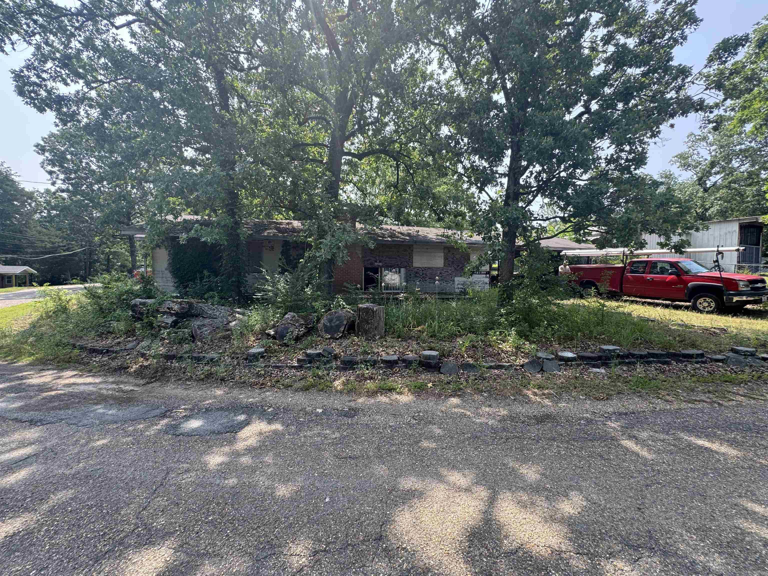 Property sits about in between Lake Hamilton and Lake Ouachita. Much of the demo work has been done. Views of the Ouachita River are across the street behind neighboring houses. Blank slate to create a great home close to the lakes! No seller property disclosure. AGENTS SEE REMARKS.