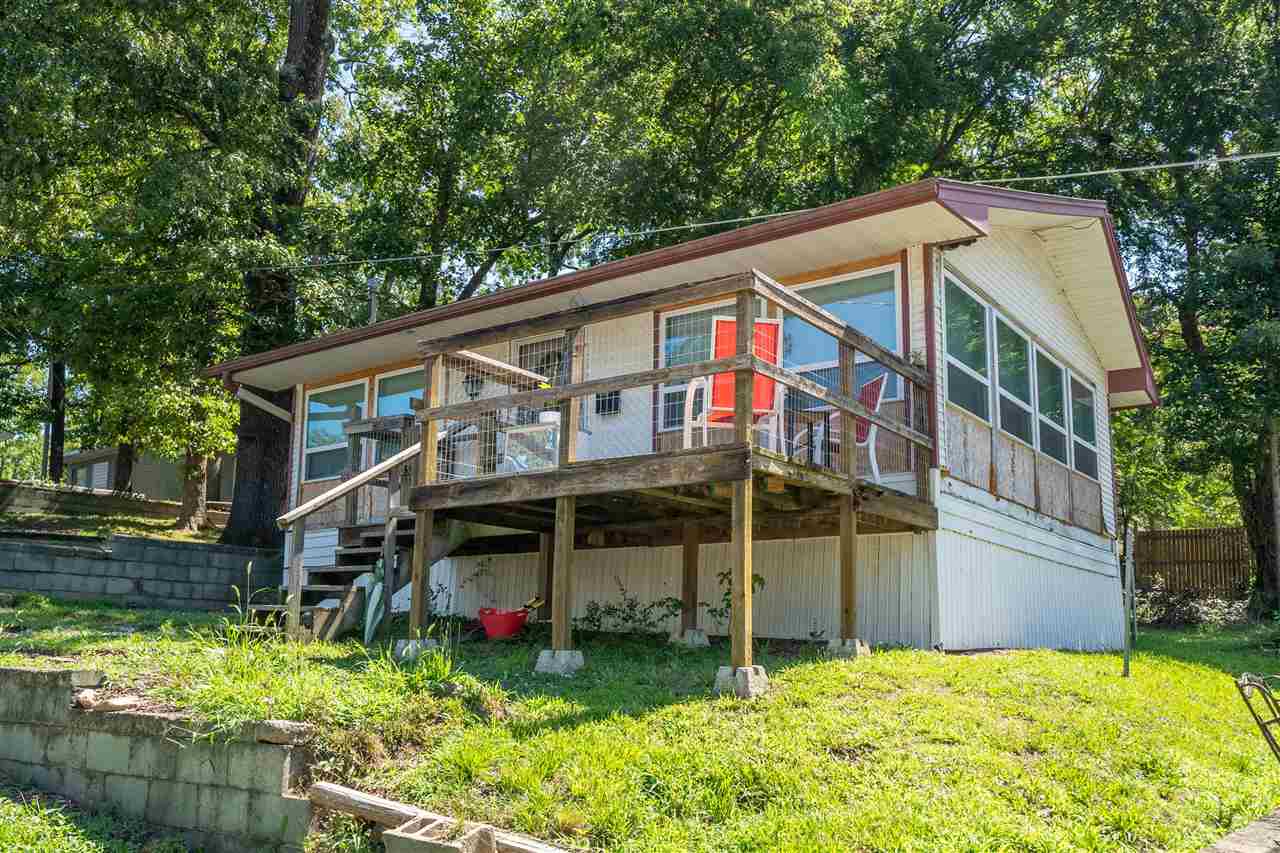 WAS $2 MILLION NOW $1,570,000. 20% CAP RATE! 4 ACRES ON BEAUTIFUL LAKE HAMILTON...WITH OVER 400' FEET OF WATER FRONTAGE...COVERED BOAT DOCKS & LAUNCHING RAMP...25 LICENSED NIGHTLY RENTALS...PREFERRED 7 SOUTH LOCATION...LESS THAN 10 MINUTES TO OAKLAWN CASINO AND THOROUGHBRED RACETRACK...ROOM FOR EXPANSION!...OFFERED AT A 12% CAP RATE...THIS IS ABSOLUTELY THE BEST INVESTMENT YOU COULD MAKE AT HOT SPRINGS, ARKANSAS...FOR MORE INFORMATION SEE AGENT REMARKS