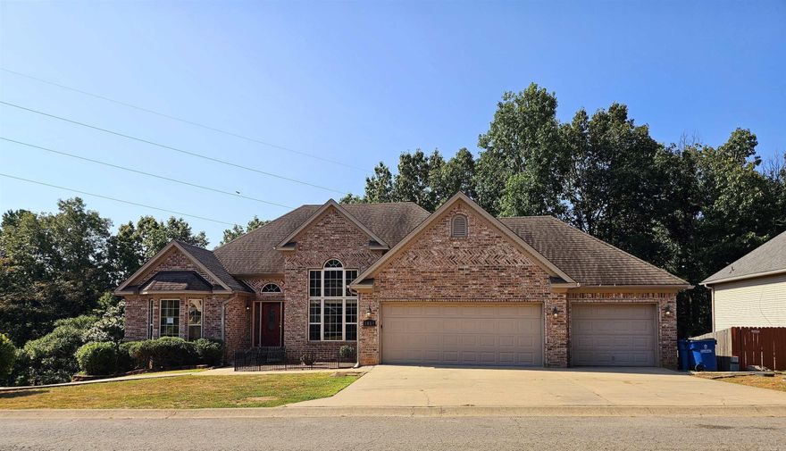 Beautifully maintained home in the beautiful Emerald Mountain subdivision. This home features a split floor plan, a bonus room and separate dining room. This home boast large windows for natural lighting and tall ceilings making this home feel must larger. Enjoy the covered back deck overlooking the wooded back yard and neighborhood walking trails. This home also features a 3 car garage for all your toys. Don't miss out on this beautiful home! Agents read confidential remarks.