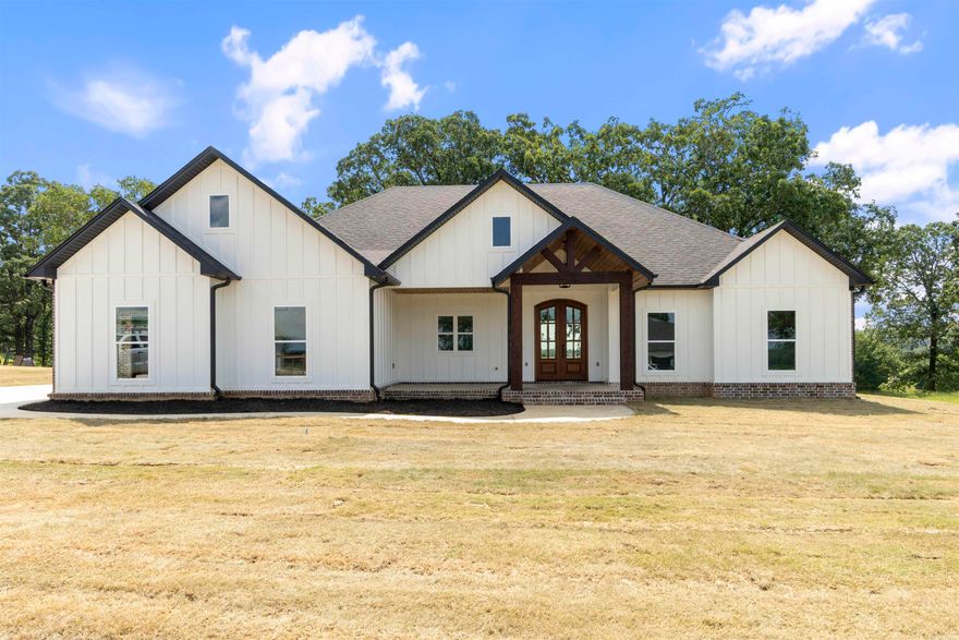 Fabulous new construction. So many extra details in this home. It offers a 3 car garage! This home boasts an amazing kitchen, lots of cabinets and a huge pantry. The primary bedroom, bathroom and closet will spoil you. From the laundry room you can access the massive closet. The bathroom has a gorgeous tile shower, soaking tub, private water closet and double vanities. There is a half bath as you come in from the garage and lockers to drop your belongings as you come in the door. The attention to detail is noticeable in this new construction home. Amazing vaulted backporch that was extended for even more space. Plus a fantastic view!