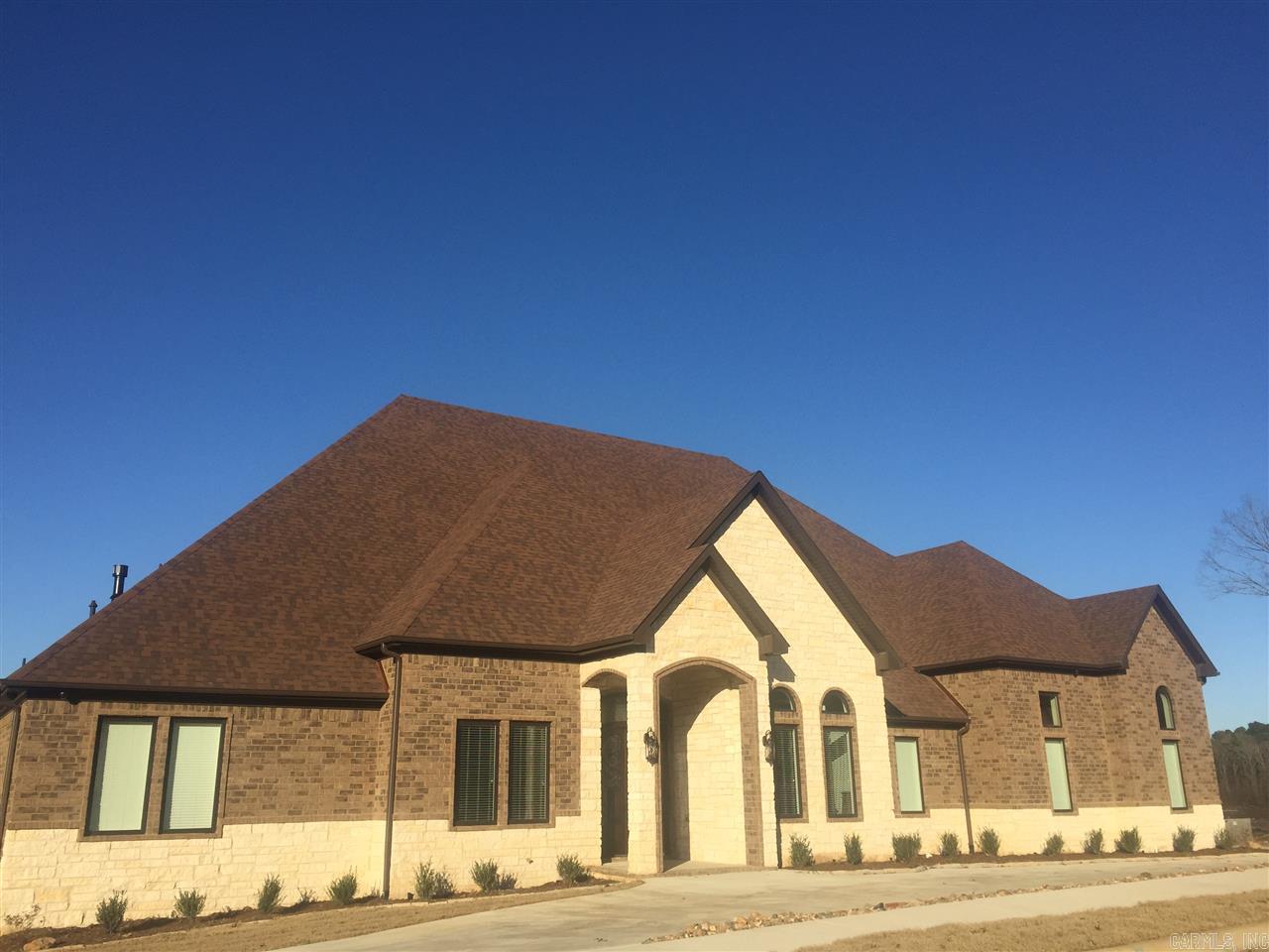 circle driveway with extra landscaping, . Formal dining , office. Kitchen has large bar overlooking great room . hardwoods in main living areas, tile and granite in nwet areas. Master has custom tile shower, large walkin closets.