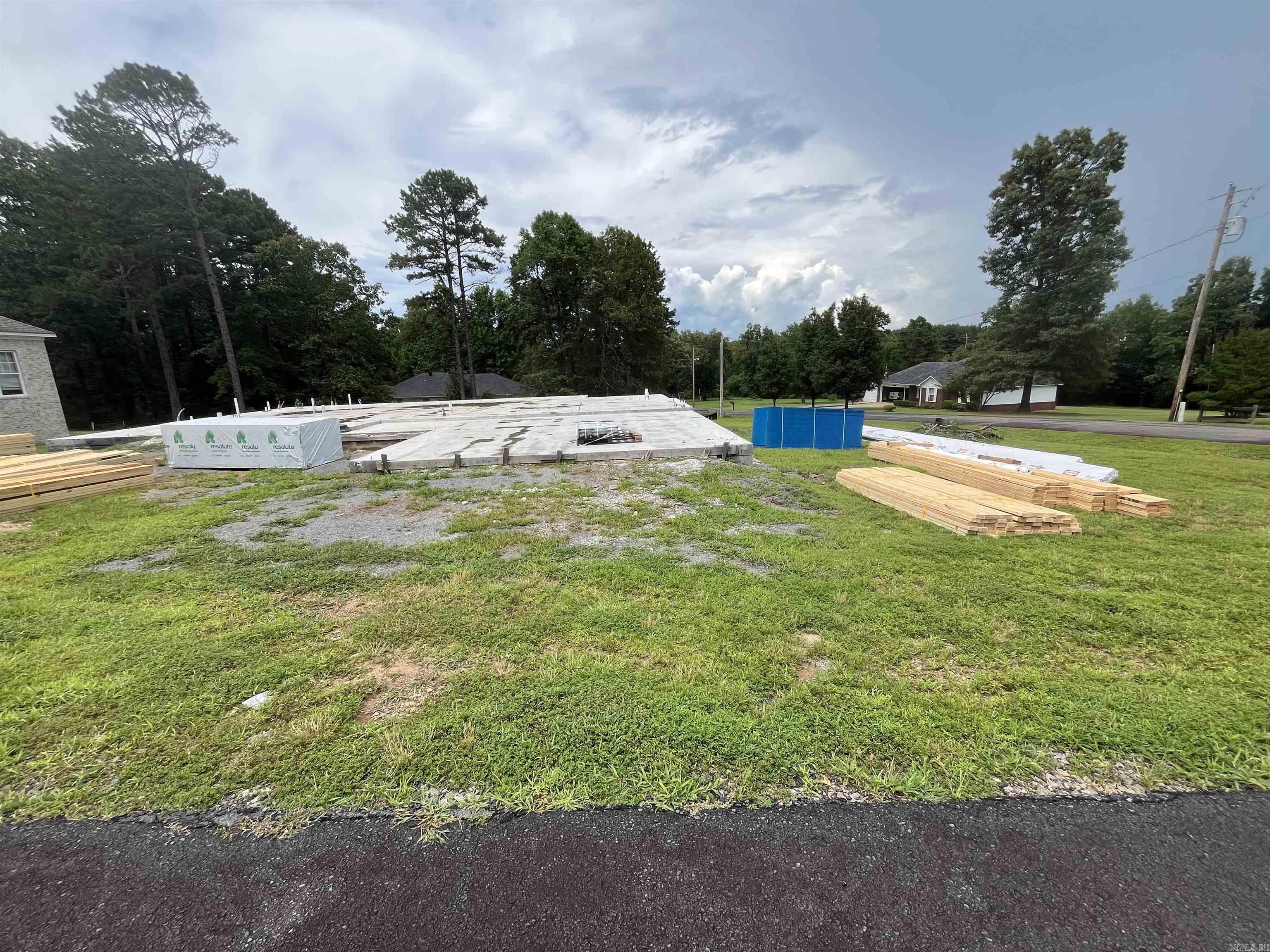 New construction. Very energy efficient. Open floor plan with custom finishes. Corner fireplace in the great room. Eat in kitchen with stainless appliances. Granite thru out. Master bath with soaker tub and walk in shower. Large bedrooms plus an OFFICE. LVP flooring. Laundry room. Nice covered back porch. Over 1/2 acre corner lot. Agents see Docs and Agent Remarks.