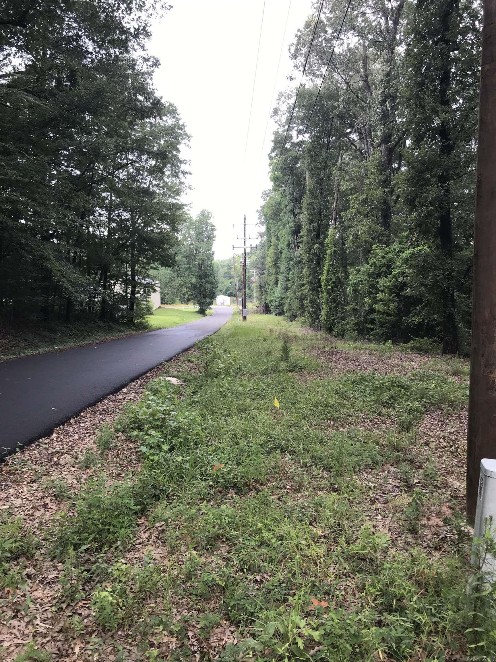 Twenty Acres on the north side of El Dorado with lots of potential. Located about one and a half miles north of the El Dorado country club, this 20-Acre +/- wooded property has frontage on both HWY 75 (N West Ave) and E 47th Street. Lots of potential with this unique property. If you are looking for land for sale in Arkansas or Union County land for sale, take time to review this listing. SELLER IS RETAINING MINERAL RIGHTS.