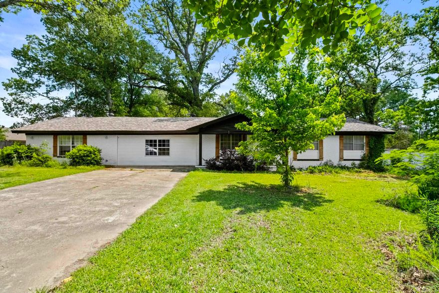 This charming ranch-style home offers 2,249 sqft  of spacious living space, featuring four bedrooms and two bathrooms. set on a nearly 1-acre lot (.97 acres), this home is perfect for those seeking both comfort and space. With an open floor plan, the living areas seamlessly flow, creating an ideal setting for entertaining. The home boasts freshly painted walls, new cabinets, and new stainless-steel appliances (2023), along with stunning granite countertops and flooring that bring a modern touch throughout. Enjoy peace of mind with a new HVAC system and roof, both replaced in 2023. Spacious bedrooms and a generously sized laundry room add to the home's appeal, while the fully fenced backyard provides privacy and ample room for outdoor activities. Located in a quiet neighborhood, this home is move in ready and waiting for you to make it your own!