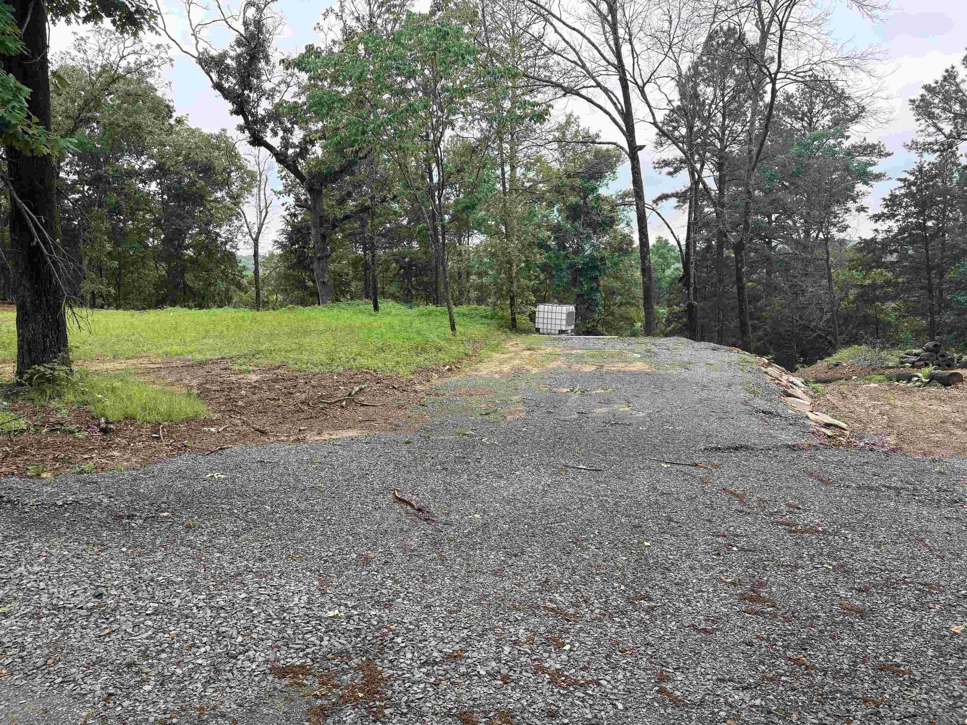Discover your private retreat on this stunning 10-acre property in the heart of Damascus, AR, just off Batesville Mountain Rd. This parcel is primed for your dream home or getaway, featuring a gated gravel driveway for secure access and a cleared building pad ready for construction. A well-maintained road winds through the property, leading to the serene creek that runs through the quarry, perfect for outdoor enthusiasts. Select trees have been cleared to enhance usability while preserving the natural beauty of the land. Ideal for those seeking a peaceful rural setting with convenient access to local amenities. Donāt miss this opportunity to own a versatile piece of Arkansas countryside!