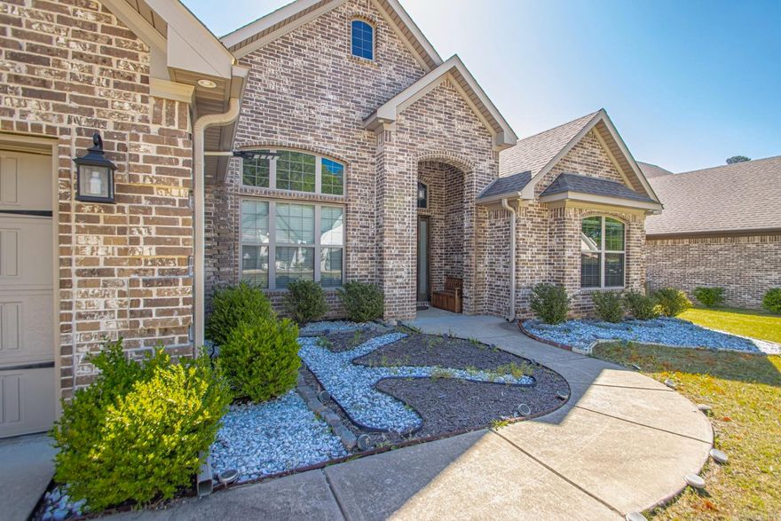 Welcome to your dream waterfront retreat in scenic Benton, Arkansas! Nestled along the serene shores of Lake Hurricane, this brand-new, luxurious 4-bedroom, 3-bathroom home offers unparalleled comfort, convenience, and breathtaking views. As you step inside, you'll be greeted by the spacious, open-concept living area bathed in natural light, where modern design seamlessly blends with the tranquility of lakeside living. The gourmet kitchen boasts top-of-the-line stainless steel appliances, sleek granite countertops, and ample cabinet space, perfect for whipping up delicious meals while enjoying panoramic views of the water.  With four generously sized bedrooms, including a lavish master suite complete with a spa-like en-suite bathroom and walk-in closet, there's plenty of space for the whole family to unwind and recharge. Each bedroom offers plush carpeting, ceiling fans, and large windows framing picturesque vistas of the surrounding landscape. Step outside to your private backyard oasis, where you'll find yourself immersed in nature's beauty. Enjoy your morning coffee on the expansive patio overlooking the tranquil waters of Lake Hurricane