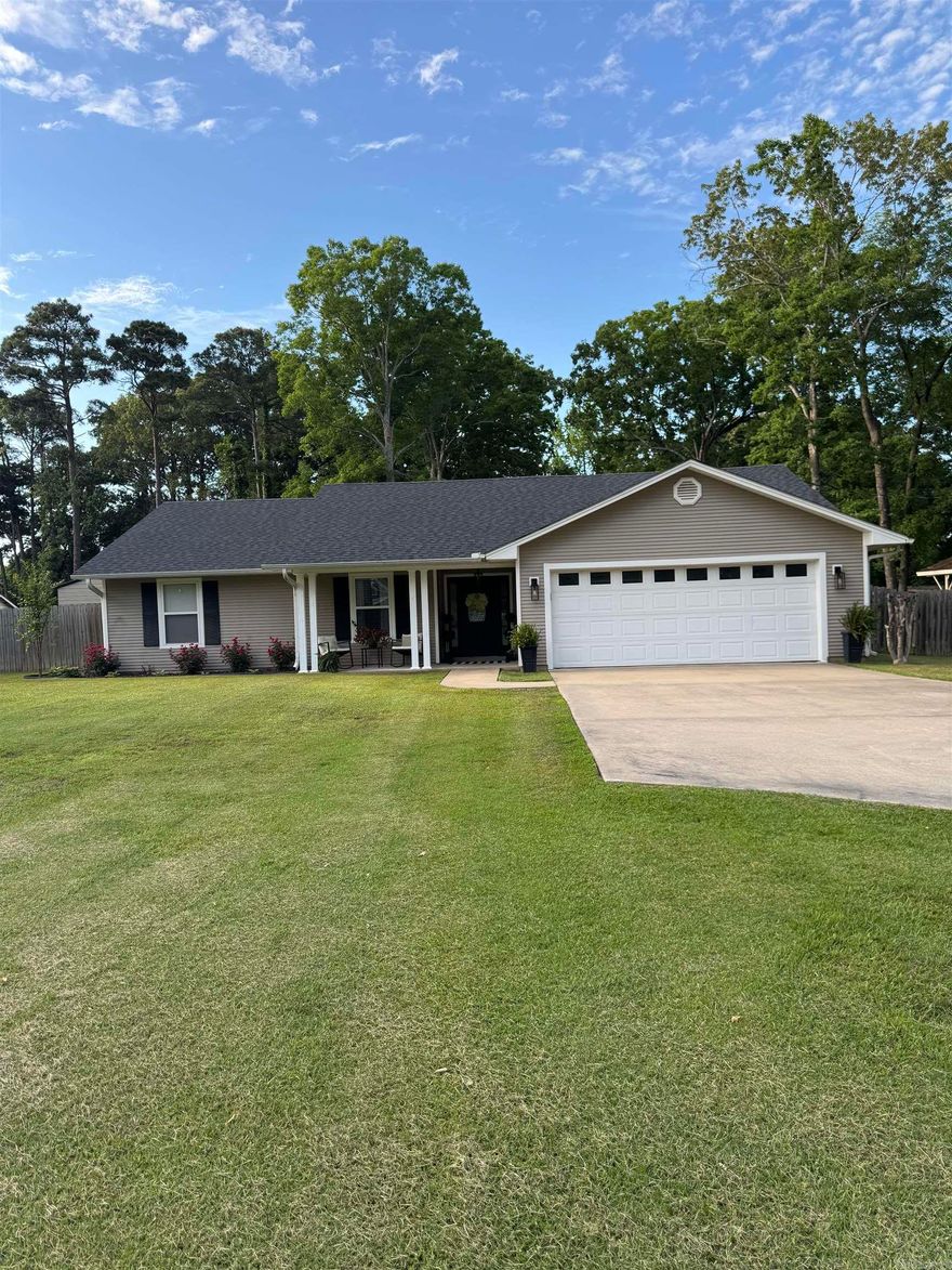 Completely remodeled and move-in ready 3-bedroom, 2 bathroom home in the heart of White Hall! This beautiful 1,774 sq. ft. home sits on a spacious .78-acre lot and is conveniently located close to the city park, elementary school, and middle school.  Step inside to find new LVP flooring throughout, new baseboards, new appliances, and a fresh coat of paint that gives the home a clean, modern feel. The huge windows across the back of the home provide stunning views of the private, expansive backyard and fill the home with natural light.  Outside, the meticulously maintained yard offers incredible curb appeal with the cutest covered front porch you’ve ever seen. The oversized backyard is perfect for entertaining with a large, covered pavilion and a covered back porch for relaxing evenings outdoors.  This home also features plenty of closet space, a dedicated laundry room, and all the updates you’ve been looking for. Don’t miss your chance to own this beautifully updated home in a fantastic White Hall location!