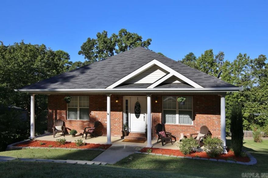 Fantastic one level home located in secluded area of North Little Rock (Crystal Hill area).  Easy access to interstates I-430 and I-40.  Property is located in Maumelle school zones.  Home was built in 2005 and is brick and siding with inviting front porch.  Open floor plan with master suite separate from guest bedrooms.  Deck overlooking valley and concrete parking pad underneath for boat, small car or ATVs... New carpet installed Sept 2015.  This is a great first time home buyer opportunity!