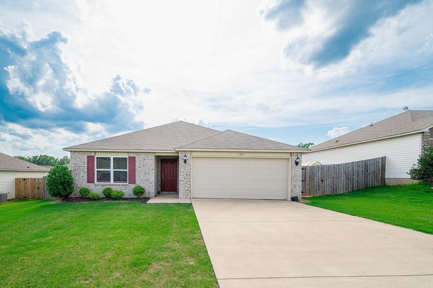 Just minutes from I-57, this charming home is nestled in the heart of Beebe. With 1,309 square feet of living space, this open-concept layout is move-in ready and ideal for comfortable living. The spacious kitchen features a breakfast bar that overlooks the dining area and living room, creating a perfect space for family gatherings or entertaining guests.  The primary suite offers a generously sized bedroom, an open bathroom layout, and a walk-in closet. Two additional bedrooms and a full bathroom provide great space for children, guests, or a home office.  Step outside to a cozy, fenced backyard complete with a covered patio—perfect for outdoor relaxation or entertaining. This inviting home blends comfort, convenience, and style in a great location.