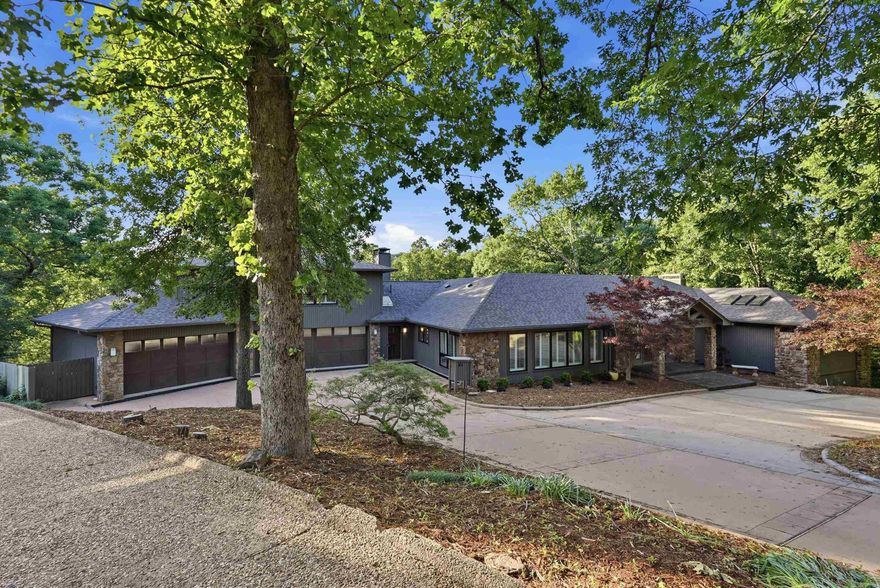 Elegant estate on 7.25 acres in the highly desirable Robinwood neighborhood. This beautifully updated home features 5 bedrooms with walk-in closets, 5 full baths, and 2 half baths, plus a separate fully equipped apartment above the garage, bringing the total to 6 bedrooms and 6 full bathrooms. A stunning wall of windows fills the space with natural light. Recent upgrades include a brand-new roof, two new HVAC units, whole-house generator, all new flooring, fresh paint, and LED lighting throughout. Designed for both living and entertaining, enjoy a spacious downstairs entertainment room with kitchenette, plus a dedicated home gym. The property also includes a private basketball court and gorgeous, expansive grounds. The apartment includes a full kitchen, bedroom, bathroom, and walk-in closet, ideal for guests, in laws, or teenagers! Luxury, space, and versatility all in one exceptional property and located in a beautiful cul de sac. Message for details or a private showing