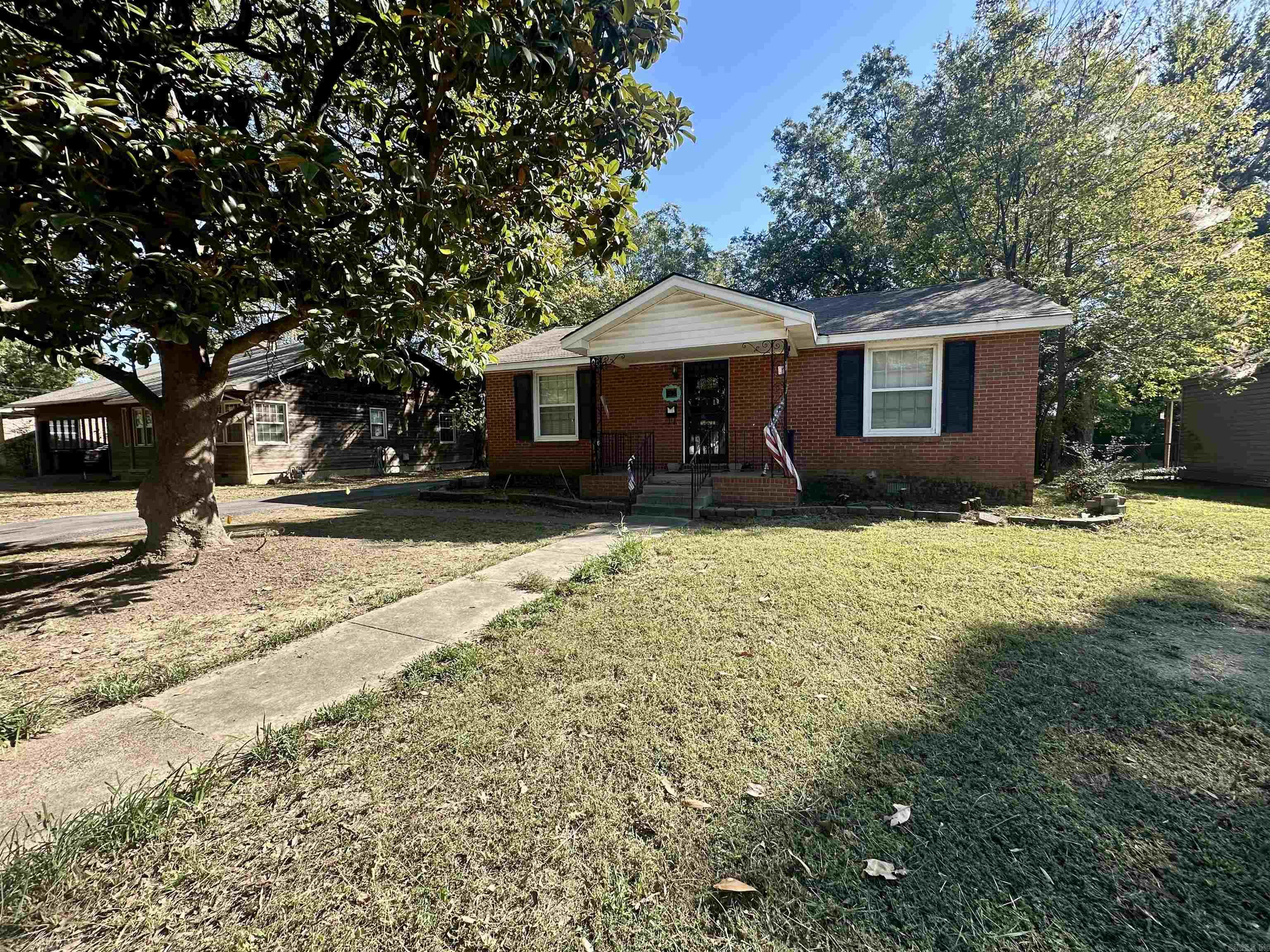 Welcome to the market 1130 Vine Street. This adorable 2 bedroom, 2 bath brick home is priced to sell! It features hardwood floors, a fenced yard, and a 2-car detached carport. Additional outdoor storage and a low-maintenance brick exterior. Two full bathrooms. Perfect for first-time buyers, investors, or would make a great Airbnb! Property to be sold as-is. Don't miss this great opportunity!