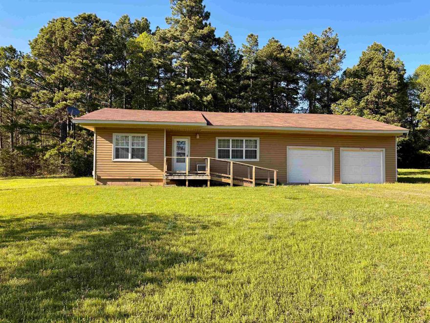 Cute 3/1 on .75 of an acre atop Petit Jean Mountain! Nice size living room. Kitchen cabinets and countertops updated in 2020. New water heater! Vinyl siding done in 2016. 2-car garage and workshop area at back of garage. Great investment property! Seller is selling AS-IS and will not make any repairs.