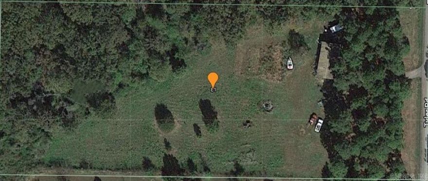 4 acres with Double Wide Mobile Home.    Agents See Remarks.