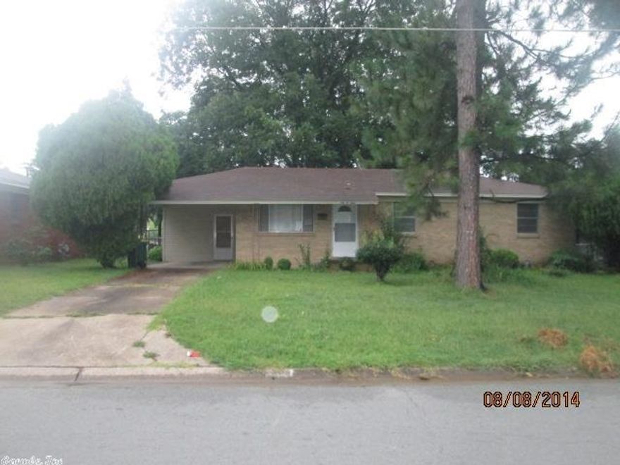 Brick home with attached carport and three bedrooms/ 2 baths. Hardwood floors in the living room and bedrooms. Open kitchen/dining room combination. Log on www.homesearch.com to submit offers and for additional information. Bidding starts on August 23rd